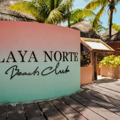 Entrance sign to Playa Norte Beach Club