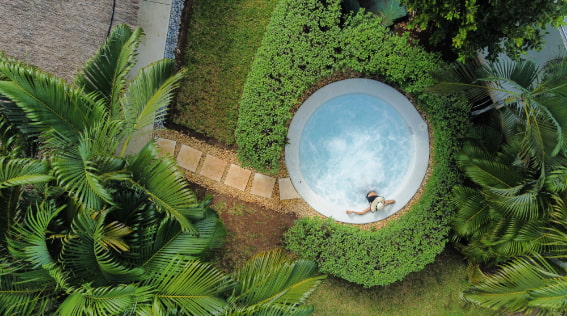 Facilities of the Privilege Aluxes complex with garden and swimming pool