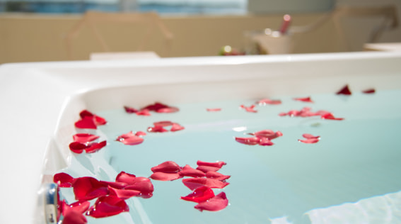 Jacuzzi with water and petals