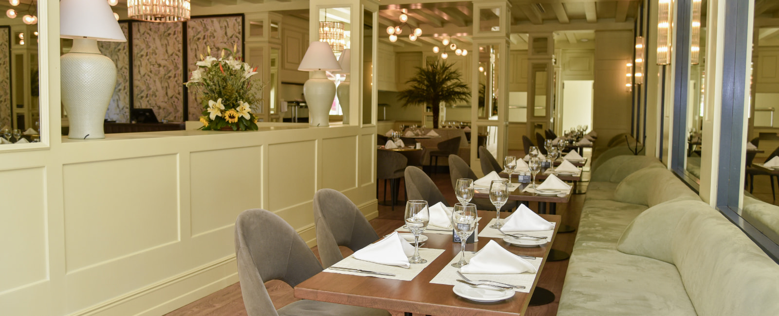 Row of tables in the dining room of the Sabor restaurant